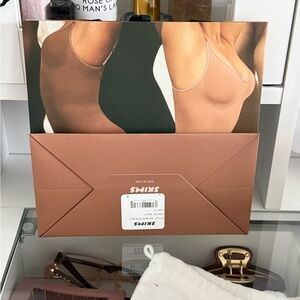 SKIMS shopping bag